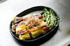 Tonpei-yaki (stir-fried cabbage and meat topped with egg)