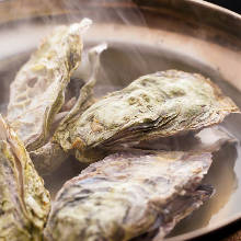 Oysters steamed in wine