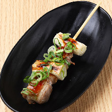 Duck and green onion skewer