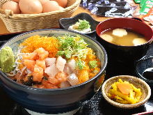 Seafood rice bowl topped with whitebait