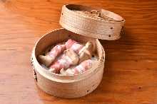 Steamed king oyster mushroom wrapped with pig meat