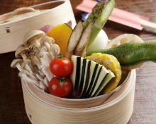Vegetables steamed in a bamboo steamer