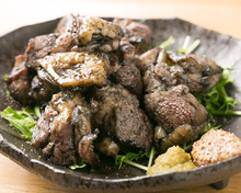 Salted and grilled locally raised chicken Salted and grilled locally raised chicken