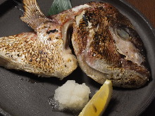 Salted and grilled fish head