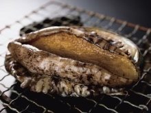 Grilled live abalone