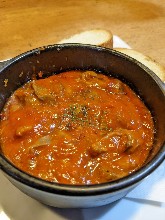Simmered in tomato sauce