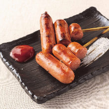 Grilled wiener sausage and bacon skewer