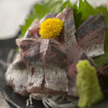 Live horse mackerel sashimi