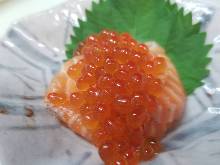 Salmon covered with salmon roe