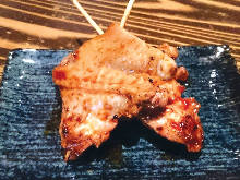 Charcoal grilled skewered chicken wing tips