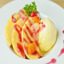 Fruit pancake with whipped cream