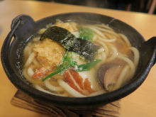 Wheat noodles boiled in a ceramic pot