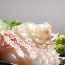 Thinly sliced sea bream sashimi