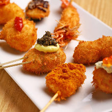 Assorted fried skewers