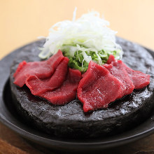 Seared wagyu beef on stone grilled bowl