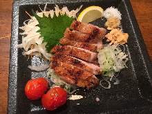 Seared locally raised chicken leg Seared locally raised chicken leg