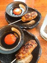 Meatballs served with egg yolk