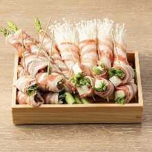 Grilled meat-wrapped skewer