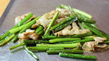 Stir-fried garlic scapes