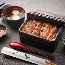 Eel served over rice in a lacquered box Heisei Three quarter eel