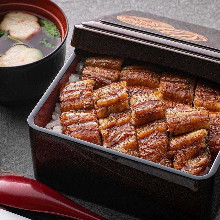 Eel served over rice in a lacquered box Showa One eel