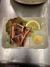 Grilled squid tentacles with butter
