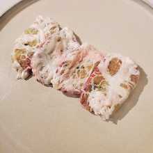 Tongue wrapped with green onions