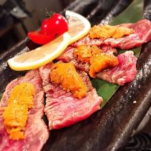 Seared beef topped with sea urchin