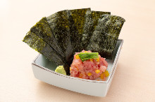 Hand-rolled fatty tuna and pickled radish sushi
