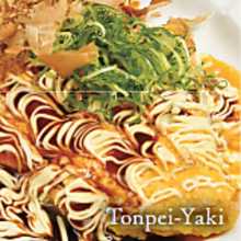 Tonpei-yaki (stir-fried cabbage and meat topped with egg)