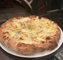 Quattro formaggi with four kinds of cheese and honey