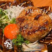 Meatballs served with egg yolk