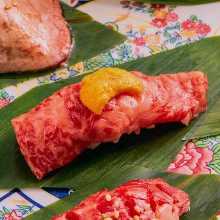 Beef sushi topped with sea urchin