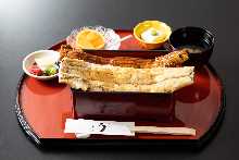 Extra premium eel served over rice in a lacquered box