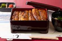 Eel served over rice in a lacquered box