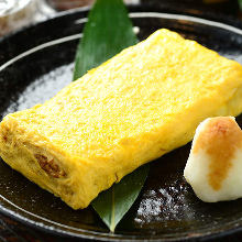 Japanese-style rolled omelet using locally raised chicken egg