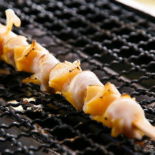 Grilled whelk skewer