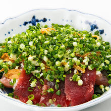 Tuna covered with green onion