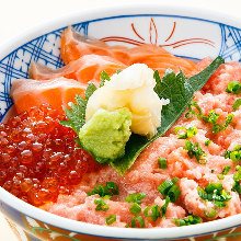 Salmon roe, salmon, and negitoro (tuna paste with green onion) rice bowl