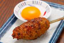 Grilled meatball skewer with egg yolk