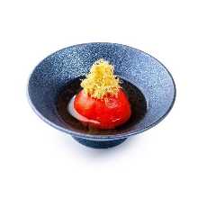 Scalded tomato steeped in dashi soup broth