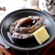 Grilled live abalone with butter