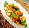 Chicken and tomato stir-fried with basil