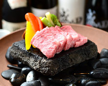 Grilled Wagyu beef on lava