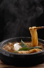 Wheat noodles in a curry broth Wheat noodles in a curry broth