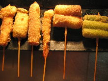 Assorted fried skewers