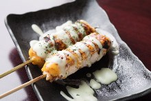 Grilled chicken tenderloin with cheese