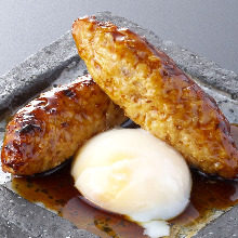 Meatballs served with egg yolk