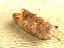 Pork wrapped green pepper and cheese skewer