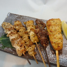 Assorted grilled chicken skewers